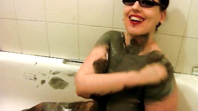 BBW in the tub covered in black paint
