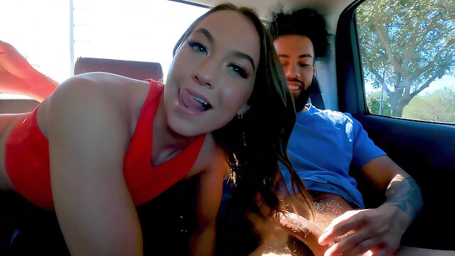 Brunette Violet Reign moans while being fucked in the car