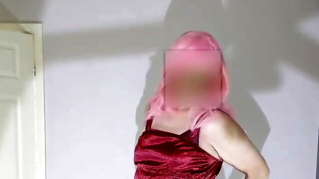 Pink haired crossdresser in full length satin