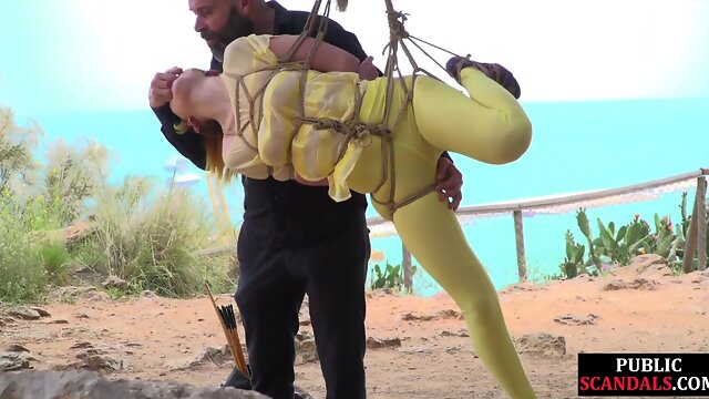 Public whore suspension bondage exposed with buttplug in ass