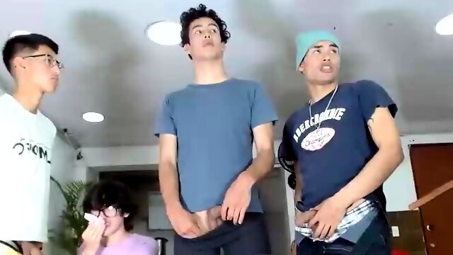 Two randy gay fellas giving blowjobs in group sex action