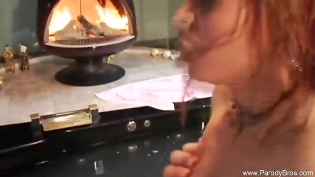 Huge-Boobed chick is railing a rock stiff prick in front of a fire place and loving it