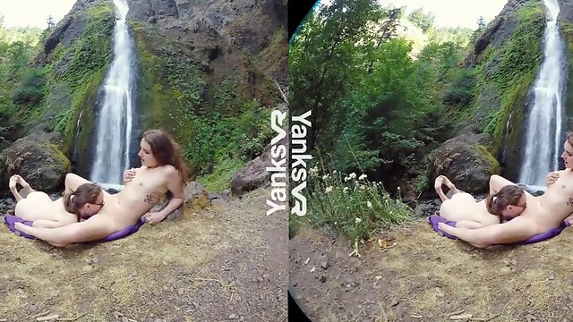 Jessica and her gf are delicately munching each othe rup in the nature, during the day