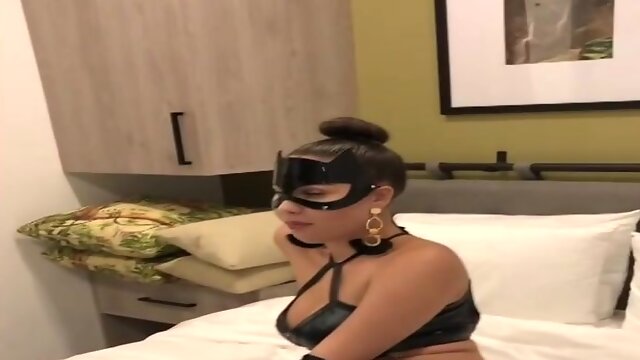 Brazilian dark haired with a mask is having ultra-kinky fuck-fest with a ebony stud and lovin’ it