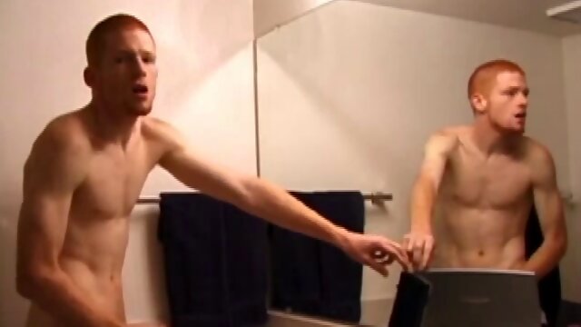 In this steamy solo scene, young Tristian goes to the bathroom to wrestle while watching porn on a laptop. After a nice long stroke, he opens that dump valve and shoots all over the mirror and the counter.