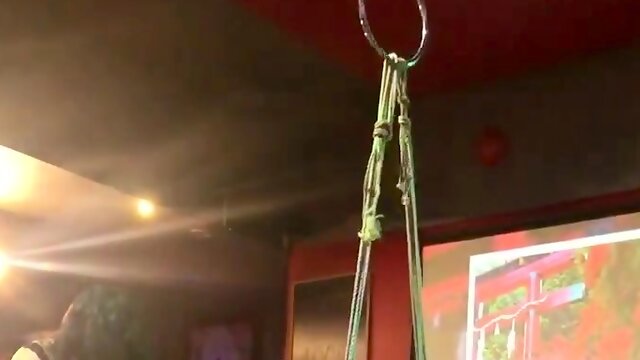 Sexy babe in lingerie gets tied up and suspended in public