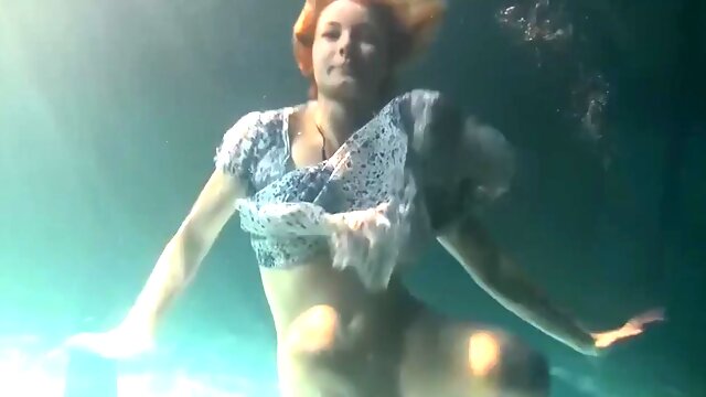 Big tits bouncing underwater in the pool