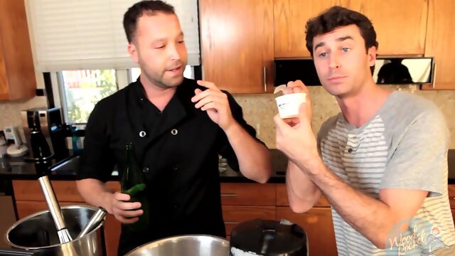 Good looking dude enjoys while making dinner for his wife