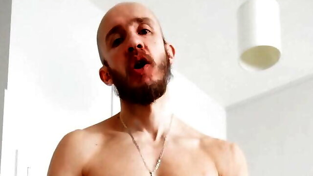 Athletic man jerkes his big dick