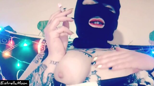 Girl With Mask Touches Her Big Tits While Smoking