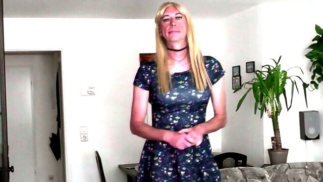 Tranny posing in short dress and stockings