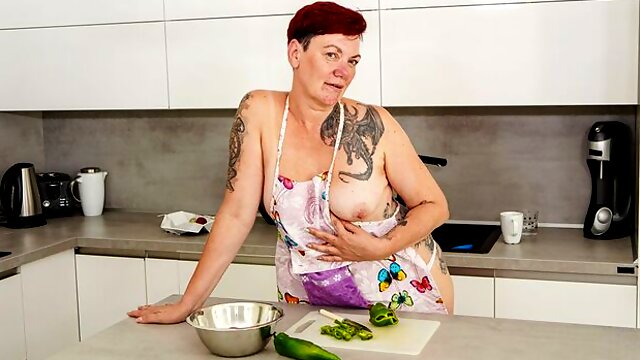 Redhead mature lady Gia R is sucking with vegetables