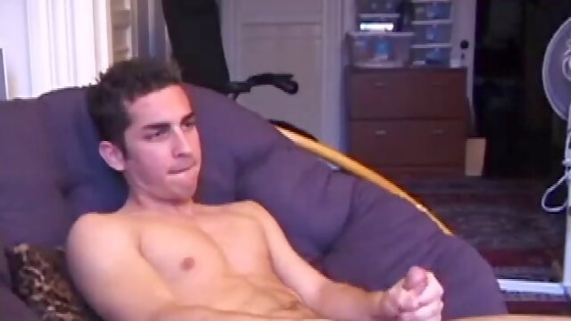 Reclining in a chair, Devon strips off his shirt and pants to reveal an amazingly toned body and big dick. After lubing up and rubbing his pack for a while, Devon really gets going as he sticks his leg back and gets into fingers in the ass.