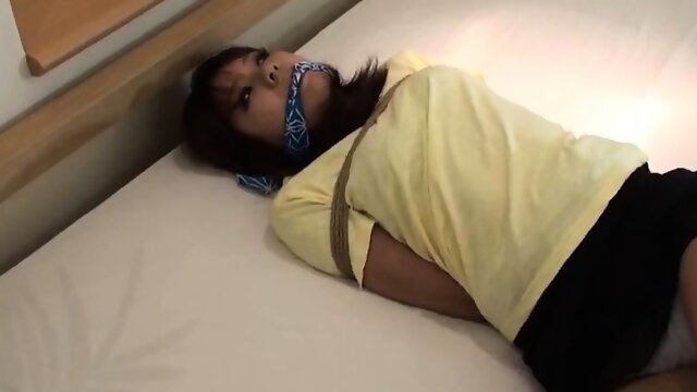 Tied and cleave gagged on bed