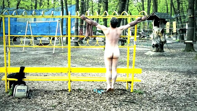 Crucified naked in public park