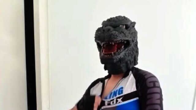 Godzilla Wanks off in Cycling Lycra