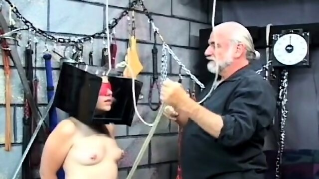 Woman screams with man smashing her muff in way-out bondage