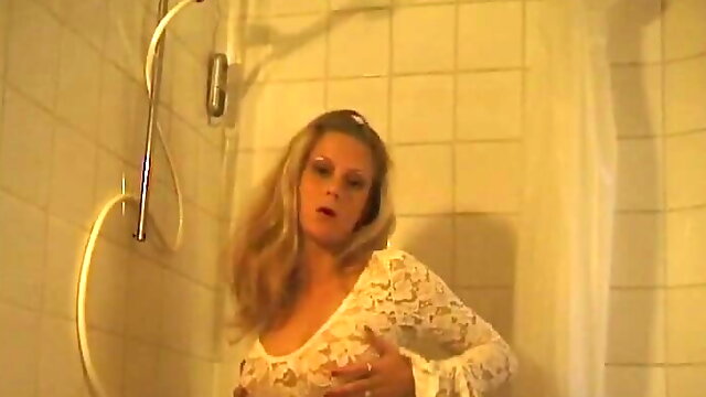 Michaela's first porn is an exhibitionist street whore masturbating her blonde pussy with a sex toy