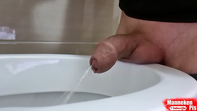 Boy pissing with uncircumcised cock