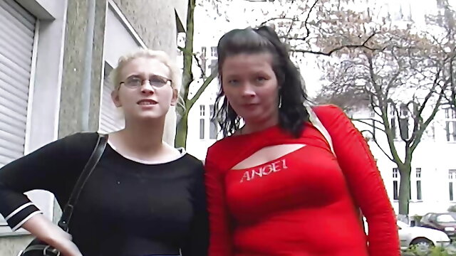 Two amazing and horny German chicks sharing a long dildo 
