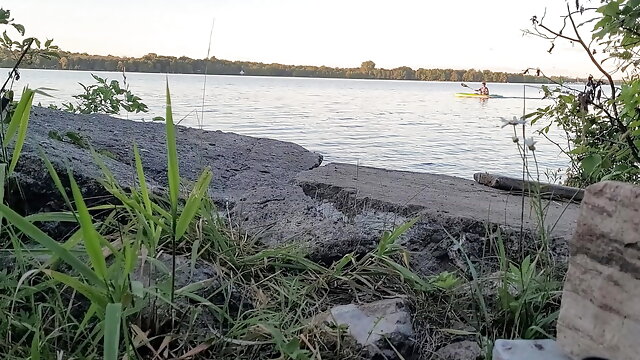 Caught naked and vulnerable by a public lake. Kayaker passing while experimenting self bondage