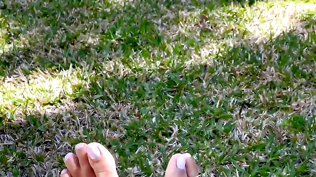Sexy feet teasing outdoors