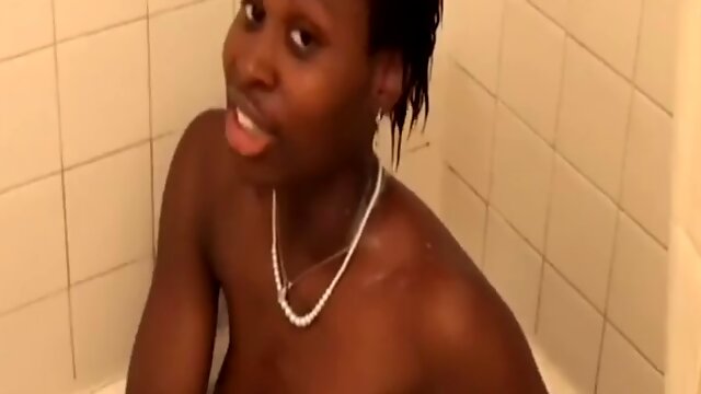 Sexy ebony teen solo strokes her pussy