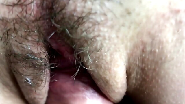 Close-up POV rubbing the clitoris with the big mushroom head of a hard cock. Huge cum load on her clit, bushes and panties.