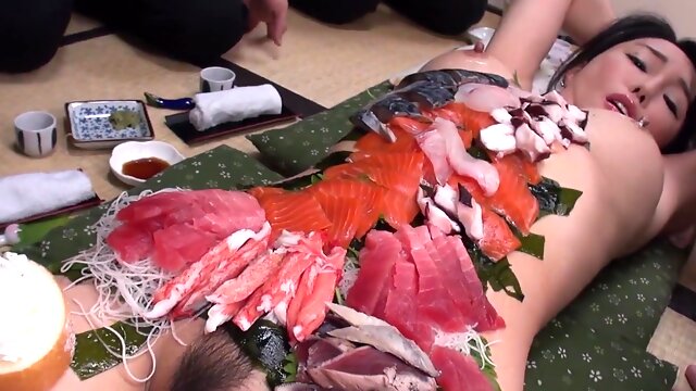 Kinky Japanese chick Haruka lets guys eat sushi off her body