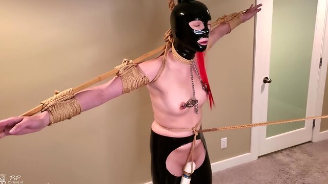 Latex Sub Stress Tied On Tiptoes In Predicament Bondage With A Crotch Rope Is Made To Cum Hard