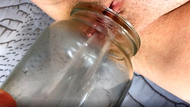 Okay, I'm pissing in a jar if you lick my pussy after that. Licking and fucking meaty pussy after pissing. Creampie. Close-up