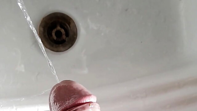 Hard cock pissing