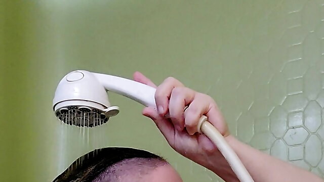 Peachesandstring washing her hair in the shower