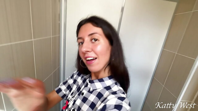 Katty films herself pissing in a public toilet