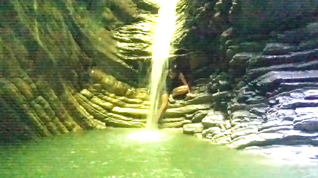 Alexa Cosmic transgirl swimming at waterfall in shirt and t-shirt... 1st waterfall