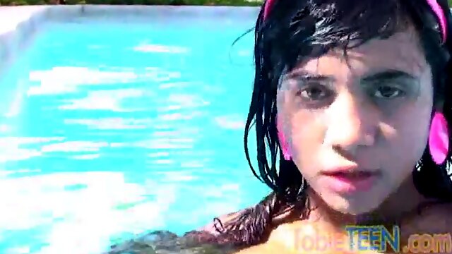 Tobie teen masturbating outdoors by the pool