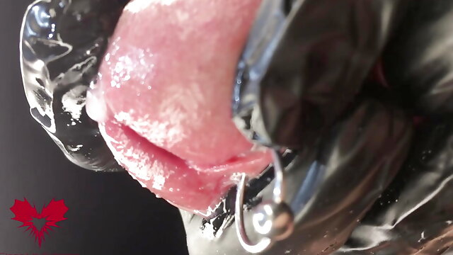This is Close Up Extreme. Second side view. Latex gloves, detailled peehole and cumshot.