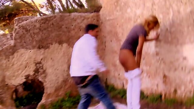 Lovely blonde girl and her partner are fucking in public places