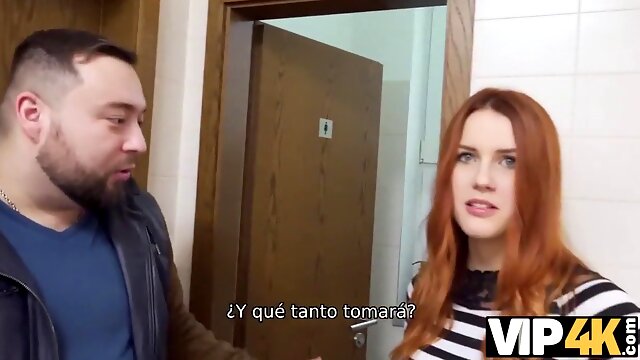 Watch as a hot redhead teen gets cuckolded by her wealthy friend in a public restroom