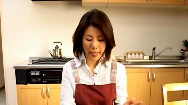 Horny Japanese MILF Mio Fujiki rides a dildo in the kitchen. HD