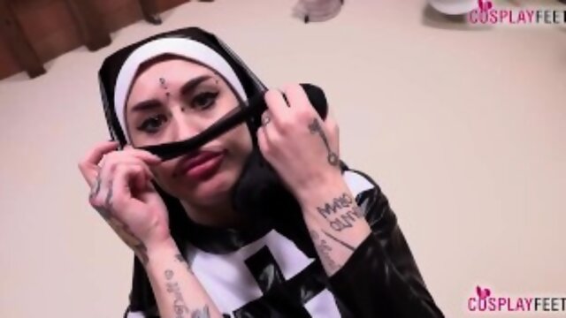 Horny tattoed Italian nun Denise takes off her pantyhose after getting horny, all the time talking t