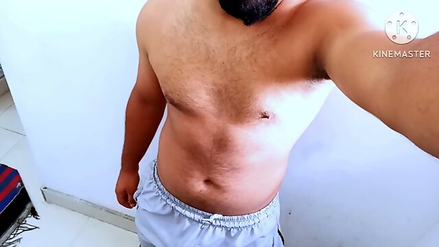 Young Indian desi gym boy big muscle body and big bulge showing in camera