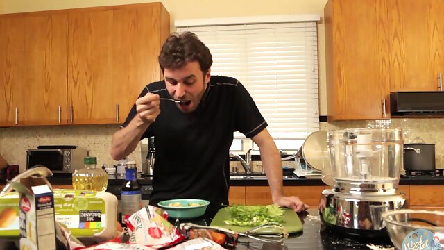 Food fetish video of a handsome guy cooking in the kitchen