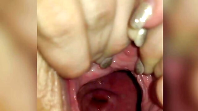Wide open pussy and cervix show
