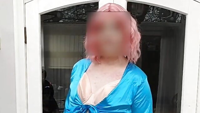 Hot crossdresser in full satin jumpsuit