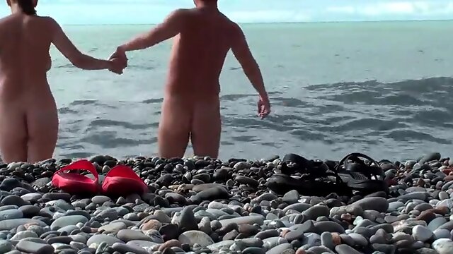 NUDIST BEACH  Naked young couple on the beach, naked teen couple