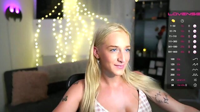 Busty tattooed long hair cute blonde webcam solo