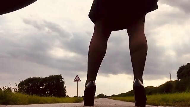 Crossdresser stilettos harness country walk about showcasing