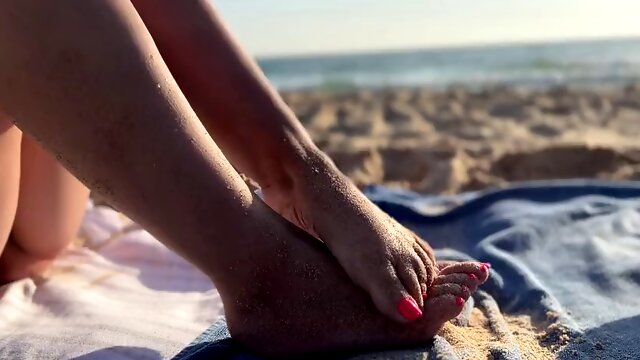 Naked on a nudist beach and paying with her feet - allfootsiefans