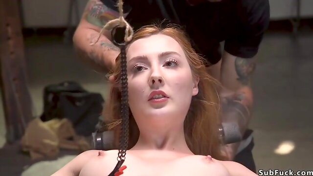 Redhead In Bondage Caned And Banged